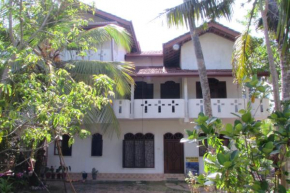 Гостиница Rainbow Guest House  Mirissa
